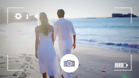 tomando fotos de una pareja con una cámara digital