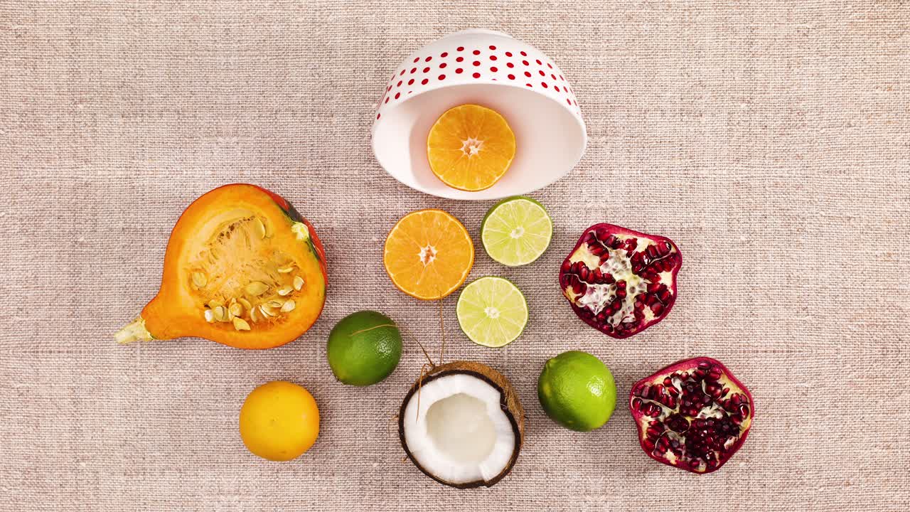Fresh slices of fruits come in bowl and disappear. Stop motion