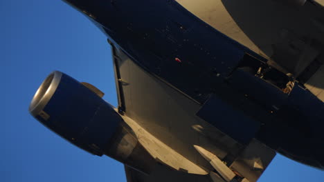 commercial jet taking off with gear doors open and landing gear folding into fuselage mid-flight