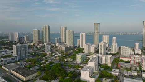 aerial view of modern residential city borough with tall apartment buildings. golden hour in town. miami, usa