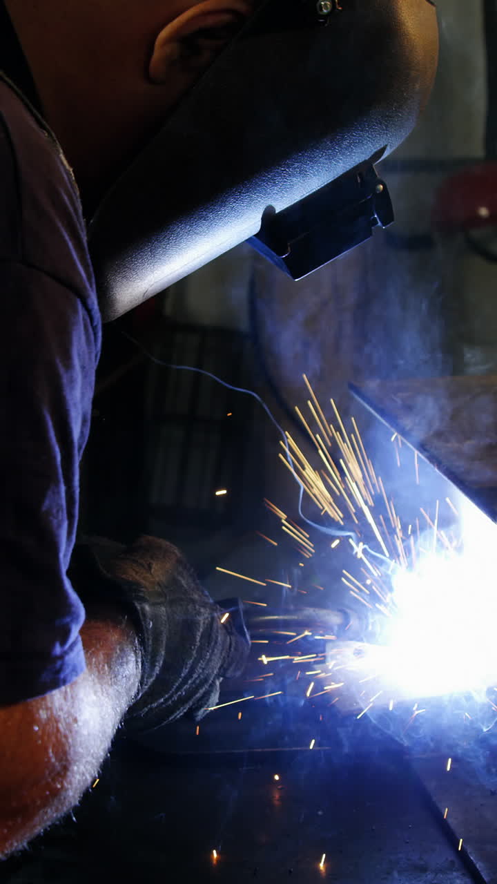 Welder welding a metal