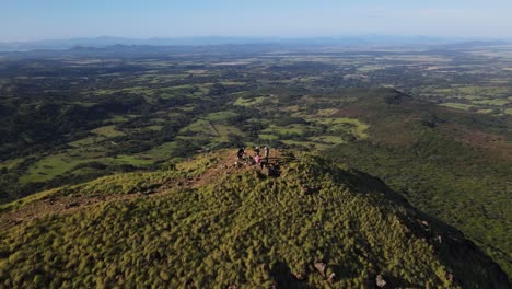 Group-of-4-people-taking-a-break-after-a-long-hike-up-cerro-pelado-in-northern-Costa-Rica