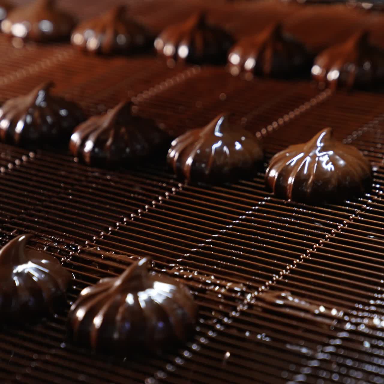Chocolate Covered Marshmallows on a Conveyor Belt
