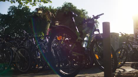 crowded bike rack in tubingen, germany in 4k downtown home of europes oldest university at sunset