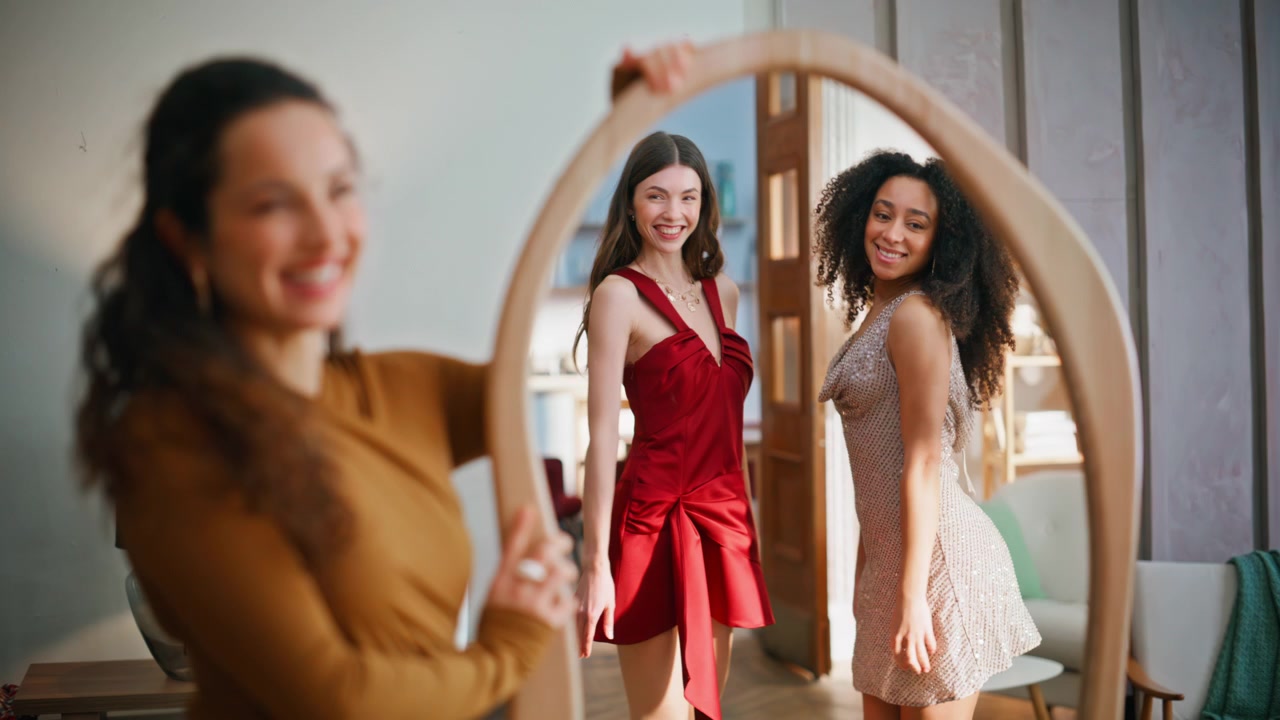 Happy friends preparing party standing mirror closeup. Three multiracial ladies