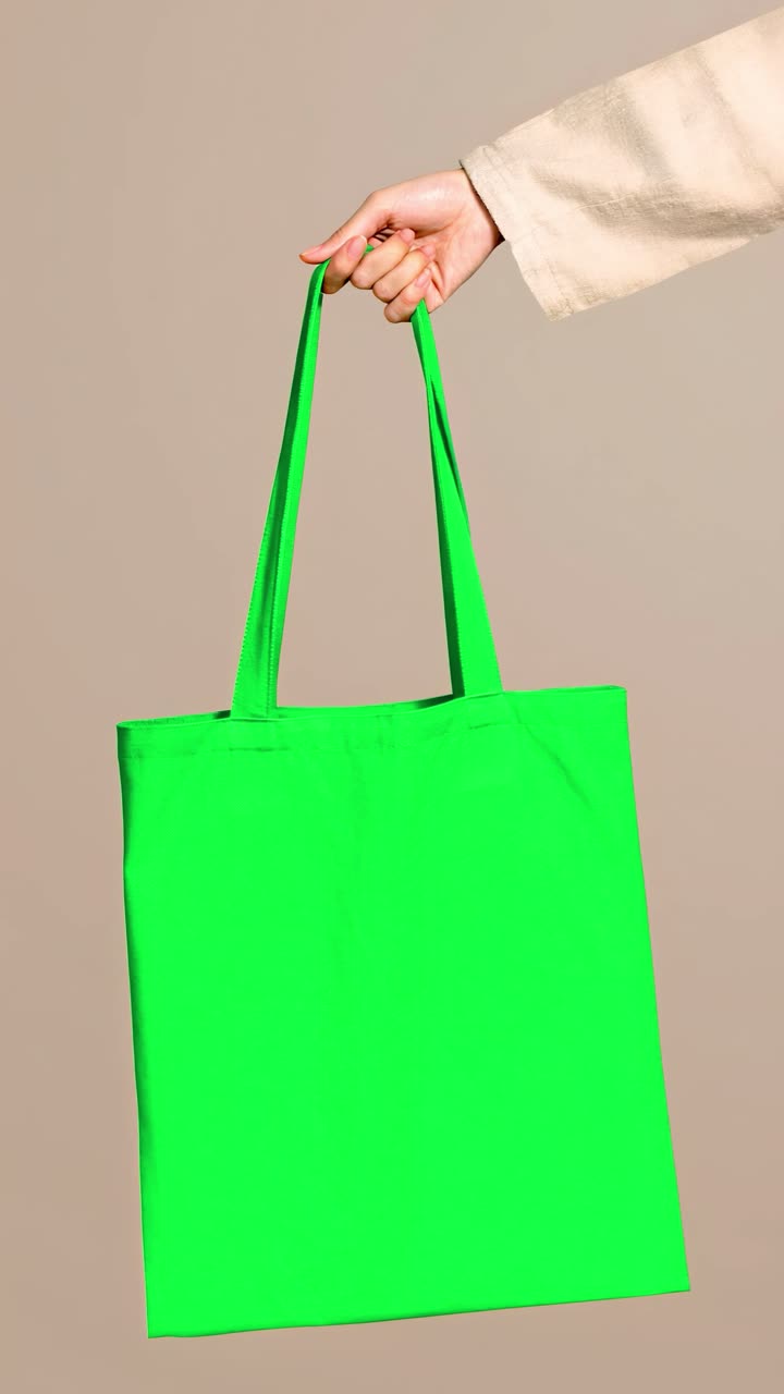 Animación de mockup real de bolso tote de lienzo, vídeo transparente en 4K, pantalla verde
