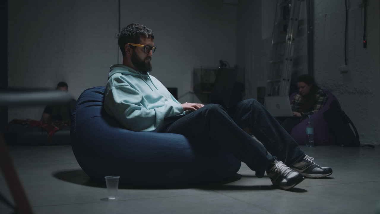 People working late in a co-working space