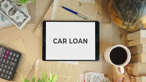 car loan displaying on finance tablet screen