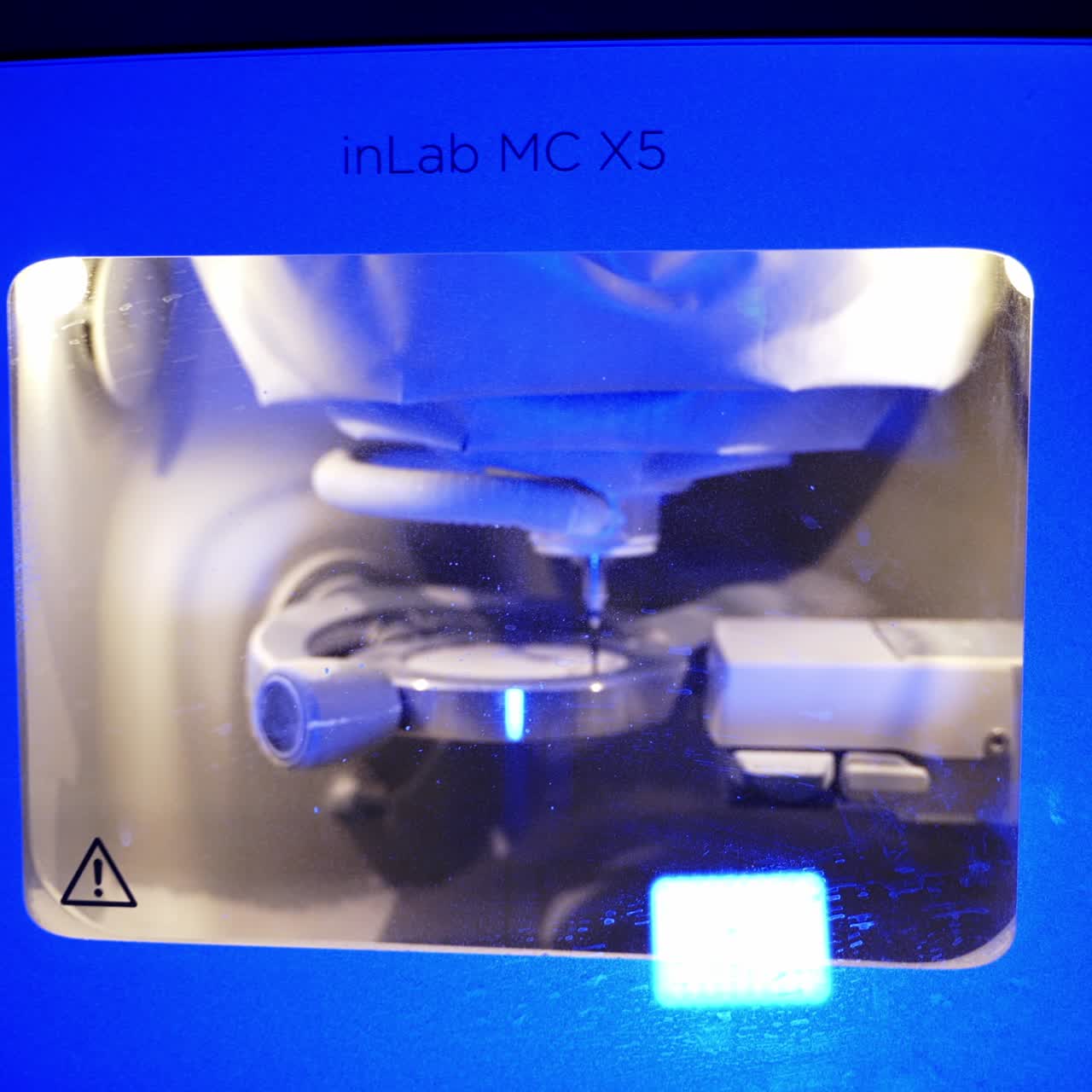 Dentist making dental implant prosthesis