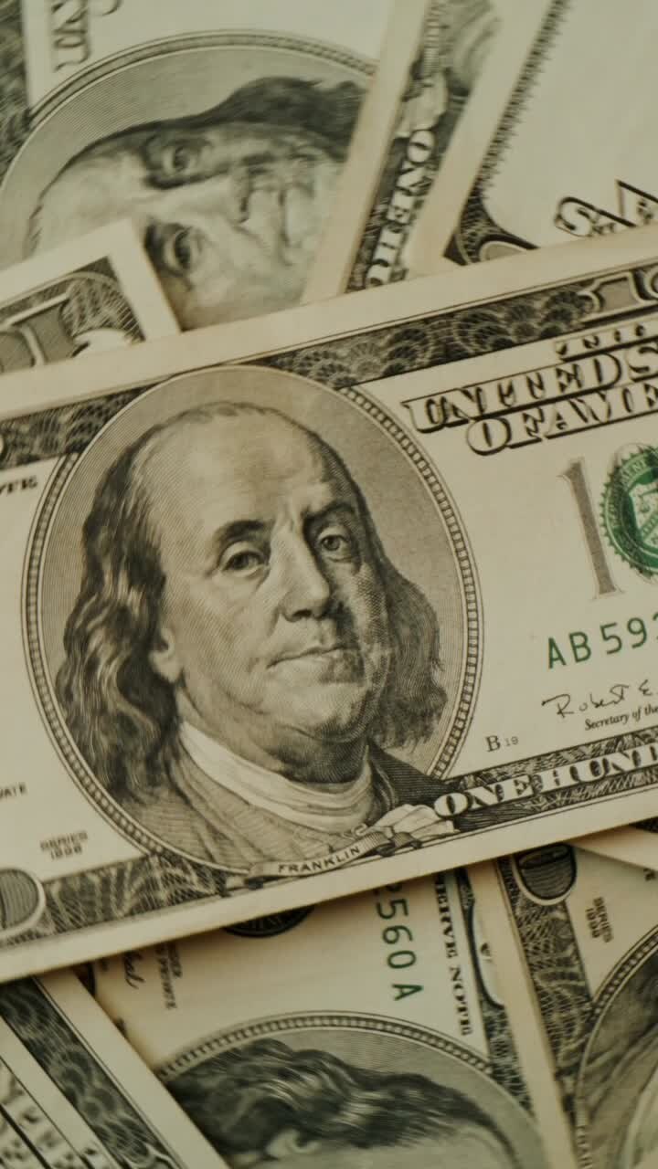 Pile of Hundred Dollar Bills