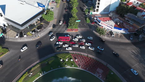 aerial shot of the minerva roundabout, west to east, and the traffic with the vallarta avenue in guadalajara, jalisco, mexico