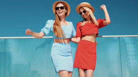 two women in summer fashion