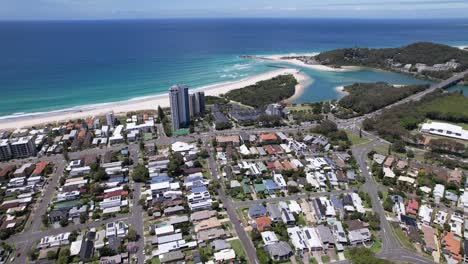 aerial view of blue sea and beach at palm beach suburb in queensland, australia.