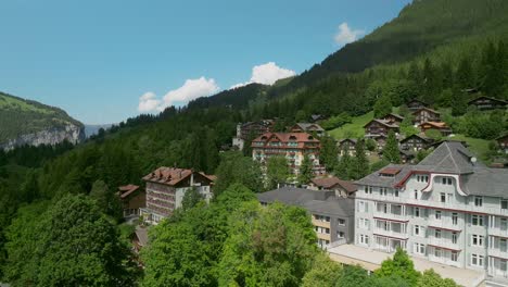 slow ascending sideways rise looking north in wengen, switzerland