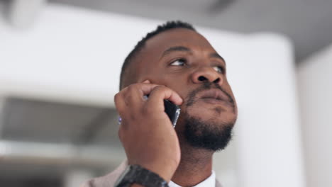 Angry,-talking-and-black-man-on-a-phone-call