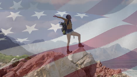 animation of american flag moving over woman widening her arms on beach