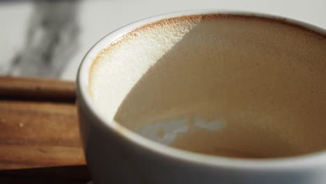 empty coffee cup in sunlight