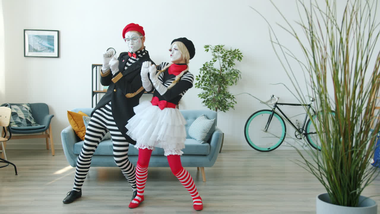 Mime Couple Dancing in a Living Room