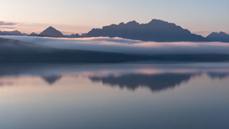 misty mountain lake sunrise/sunset
