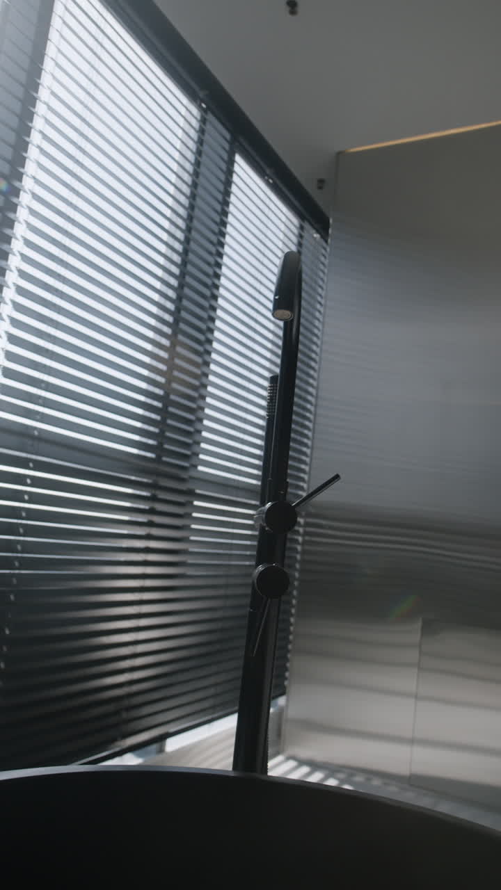 Modern Minimalist Bathroom with Black Faucet