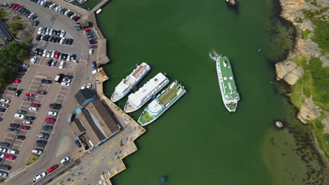 saltholmen, gothenburg - view of the luxury yacht and different cars - aerial shot