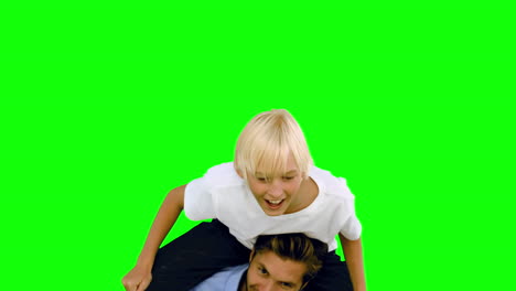 son jumping on his fathers back on green screen