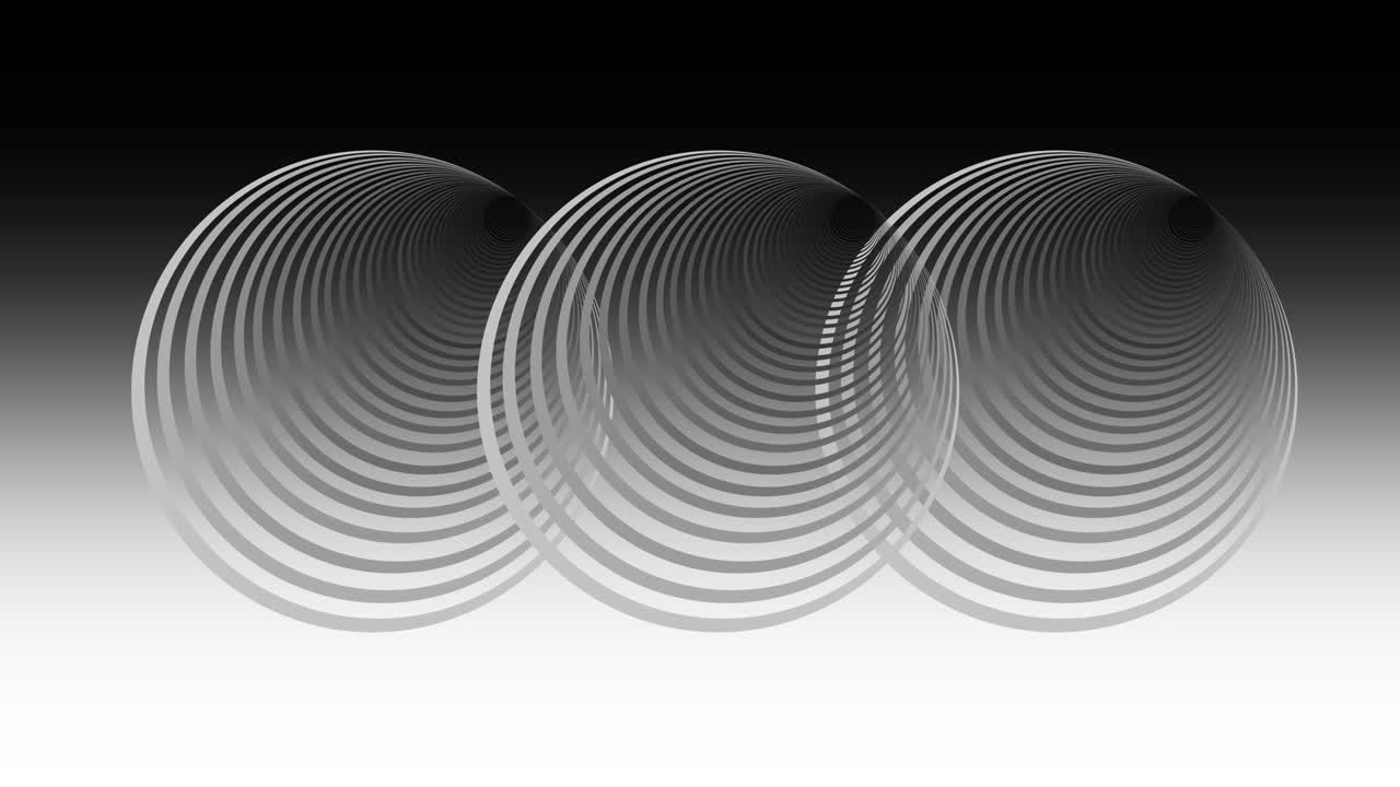 Three transparent cone shaped items in black and white