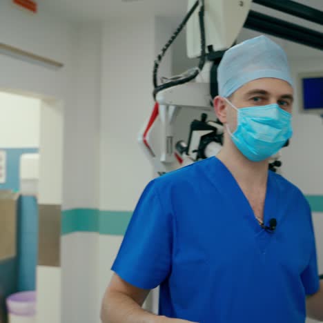 surgeon comes to the operating room in hospital. professional doctor in blue medical uniform and mask before the surgery in the modern operating theater.