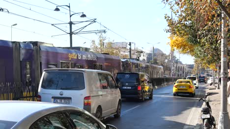 istanbul street scene with tram and vehicles