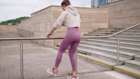 woman stretching outdoors