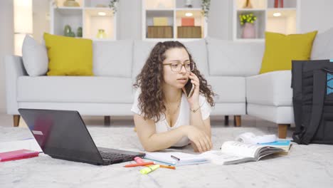 Female-student-Talking-Unhappy-On-The-Phone.