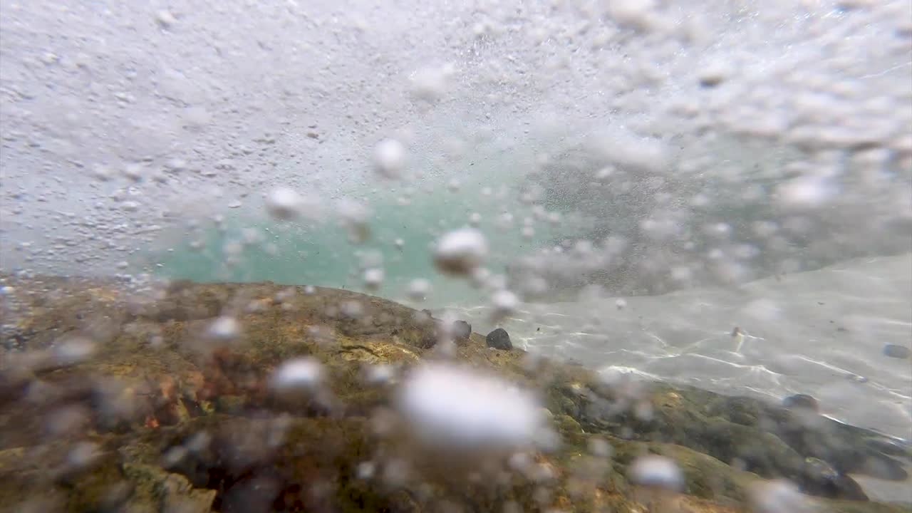 sea surge in small tidal pool