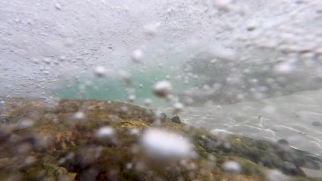 sea surge in small tidal pool