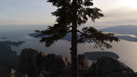 scenic view of islands and ocean at sunset from mountain top in bc