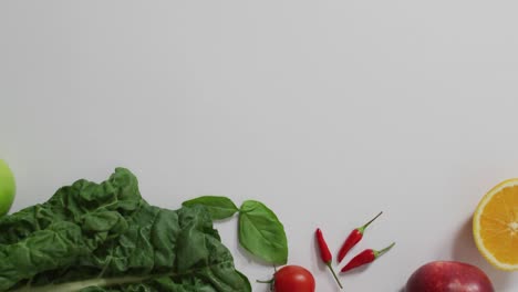 video of fresh fruit and vegetables on white background