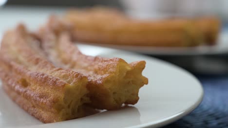 Close-up-shot-of-Spanish-snack-fried-dough-known-as-Churros,-ready-to-eat