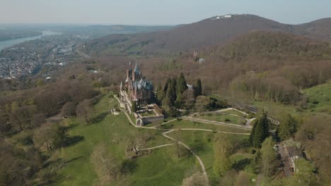 Drone---Aerial-shot-of-the-castle-Drachenburg-and-the-river-rhine-Siebengebirge-near-Bonn---Königswinter-30p