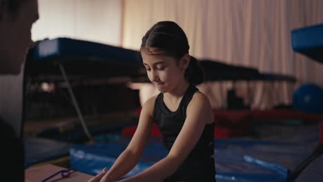 young girl training in a gym