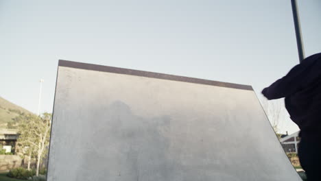 skater performing tricks at a skatepark