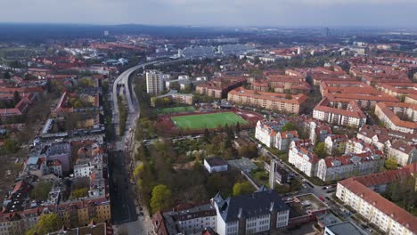 Marvelous-aerial-top-view-flight-Berlin-City-Soccer-football-field,-district-Steglitz-Germany