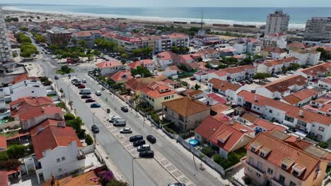 static drone shot from avenida dom sebasteao in costa da caparica, portugal