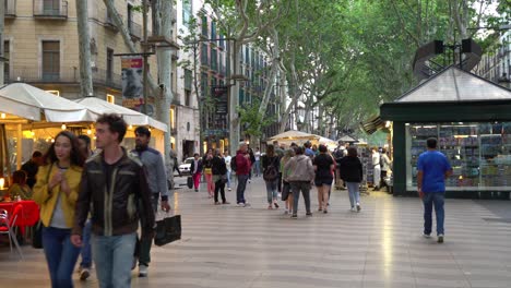 people walk down the street