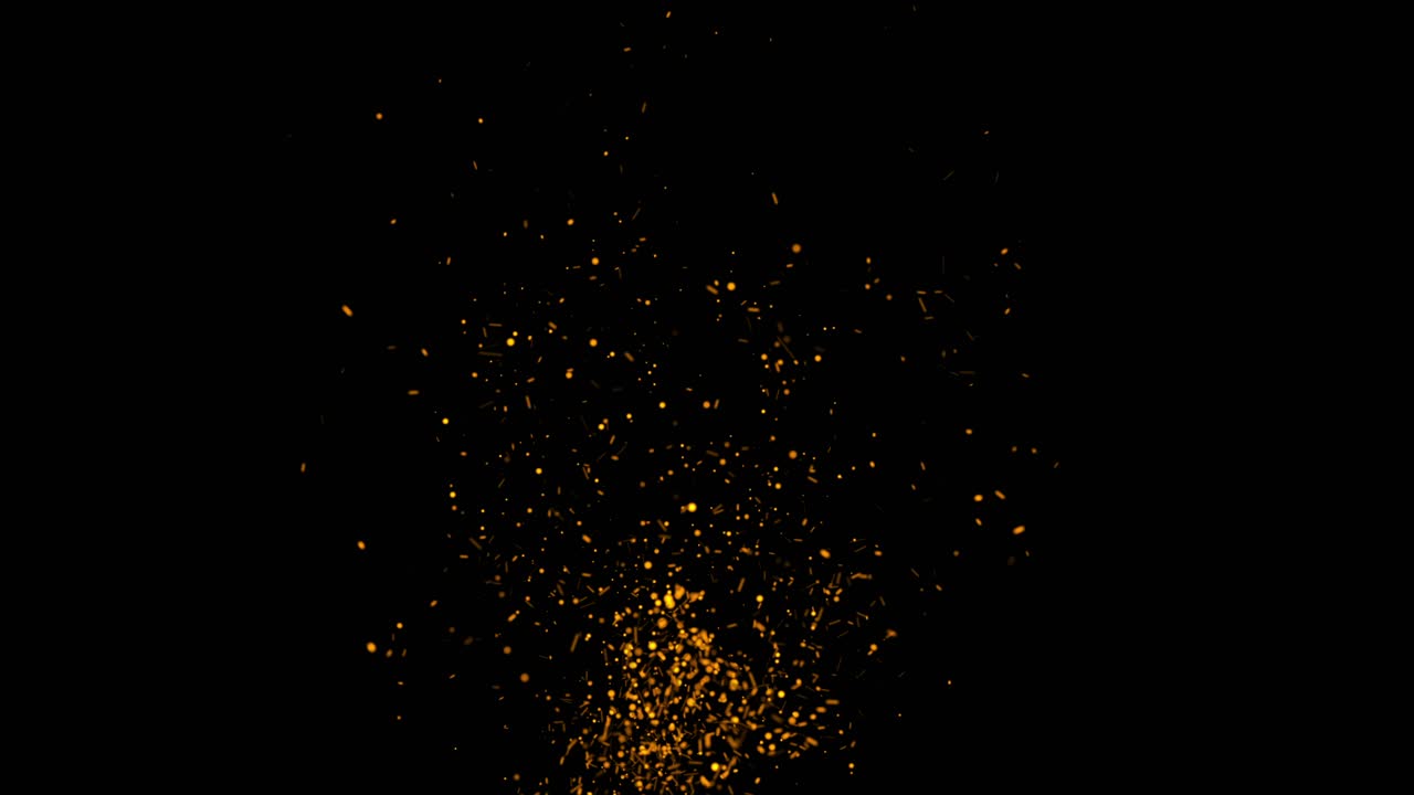 Particles of fire sparks rising through the screen on black background