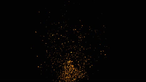 Particles-of-fire-sparks-rising-through-the-screen-on-black-background