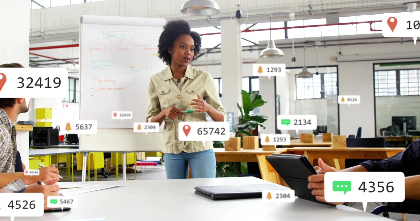 Business presenter pointing at flipchart, causing pins and counters showing stats while team noting