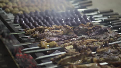 Close-up-of-meat-on-skewer-on-the-grill