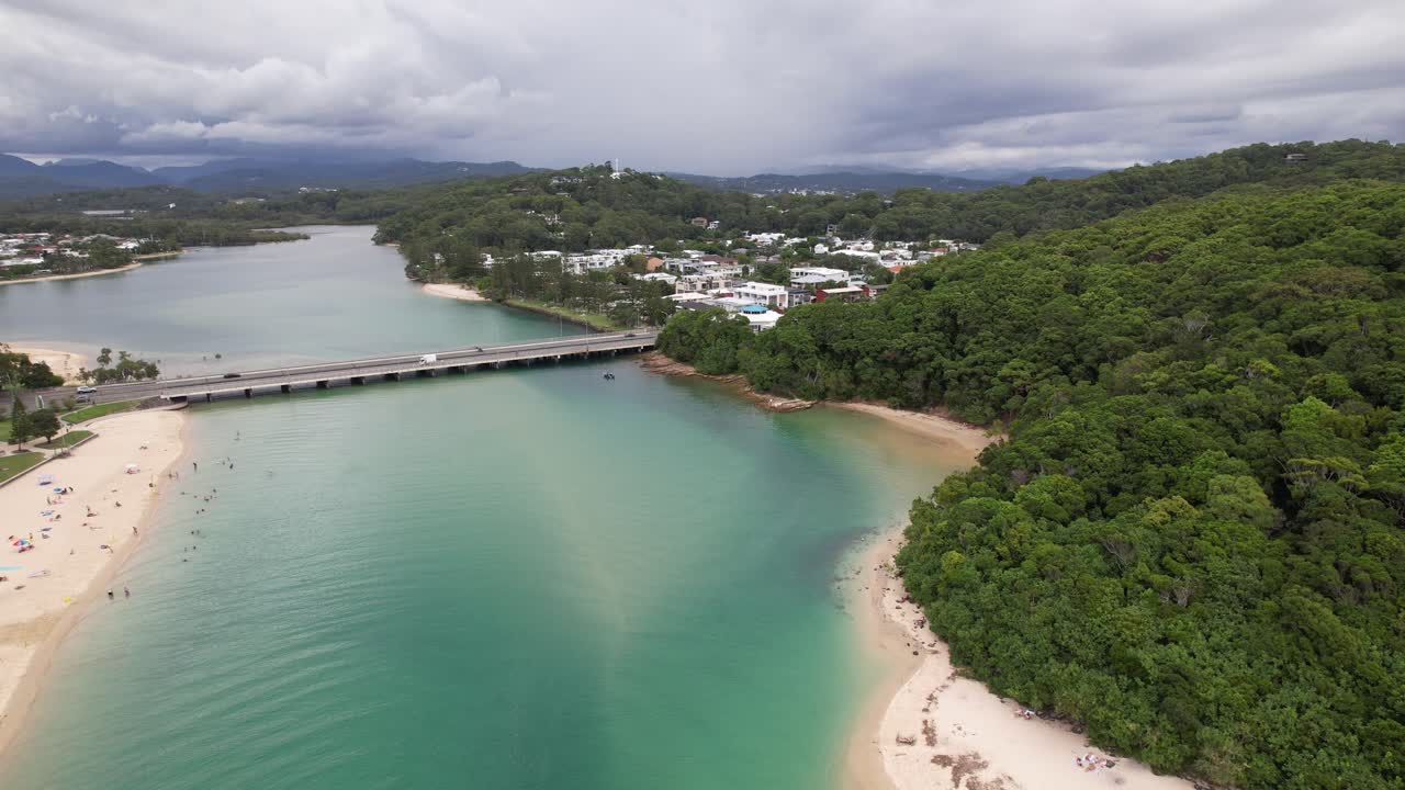 Tallebudgera Creek Bridge And Tallebudgera Beach - Burleigh Headland National Park In Gold Coast, QLD, Australia. - aerial pullback shot