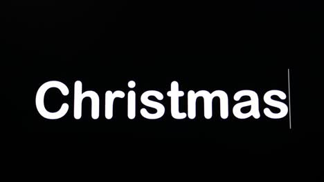 text written on black screen with the word christmas in white