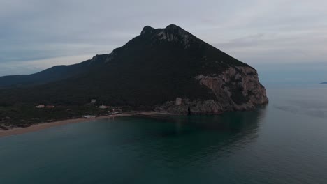 Italian-coastline-close-to-Rome-Sabaudia,-Circeo-Ascension-tilting-down-of-mount-circeo