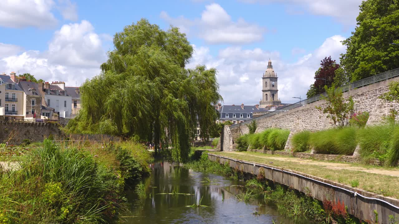 Beautiful willow tree and cityscape of Vannes il Bretagne in France on sunny day